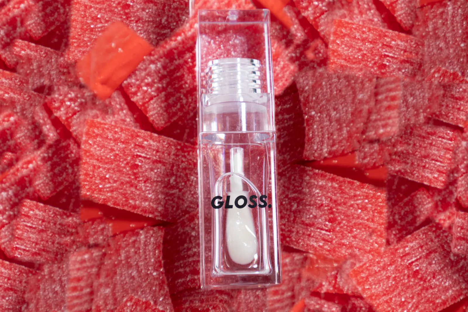 Cherry Candy gloss on a pile of sour cherry candy