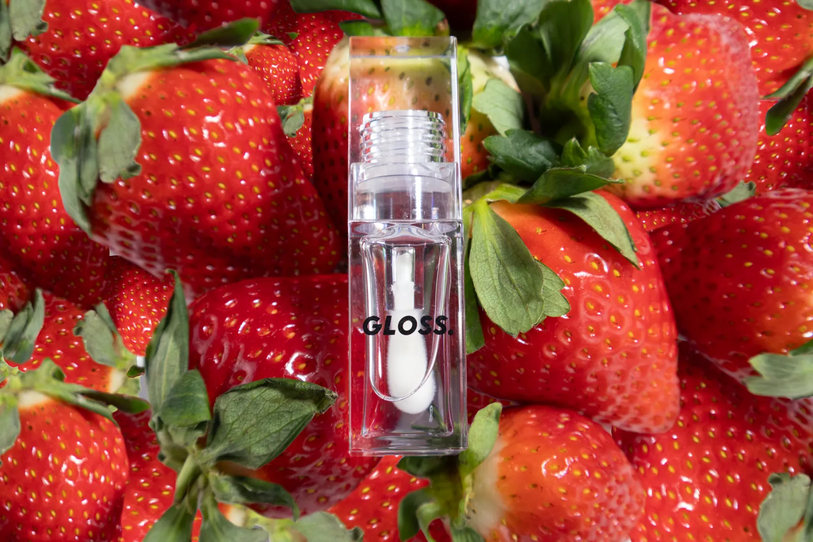 Strawberry gloss on fresh strawberries